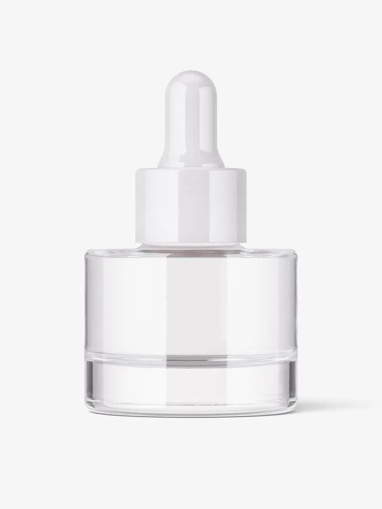 A short wide clear glass dropper bottle with a white pipette and a visible internal tube.
