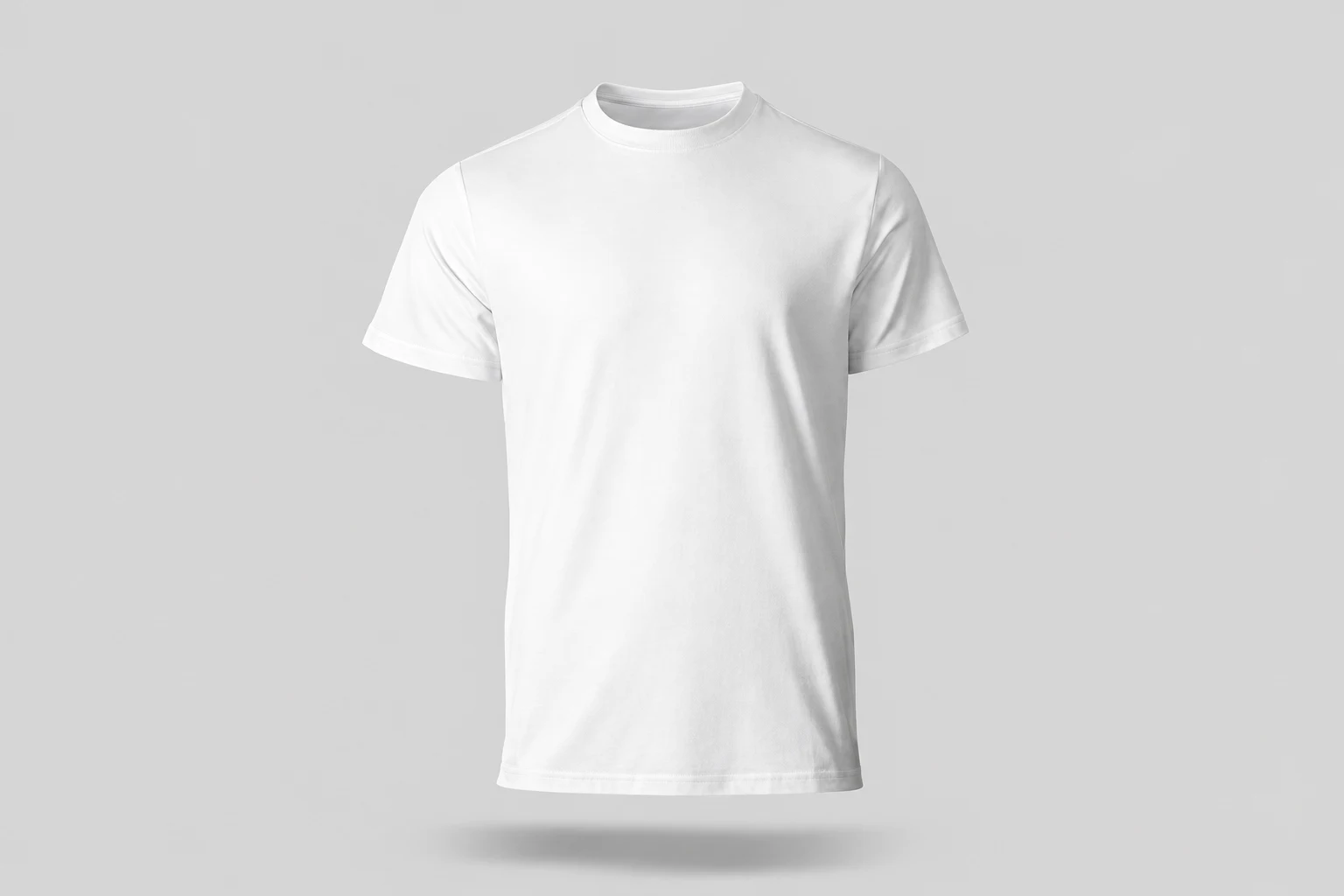 Plain white short-sleeve T-shirt floating front-facing against a light gray background with a faint shadow.