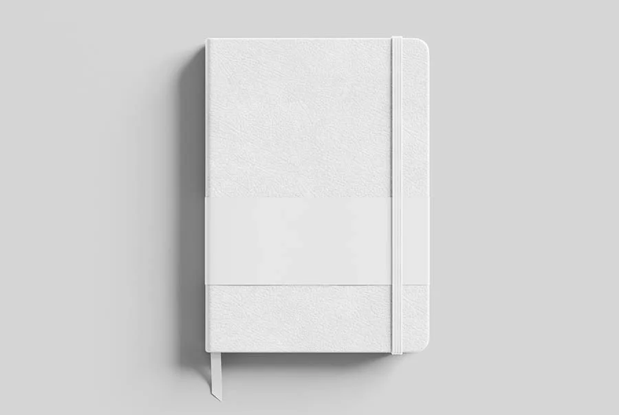 Front view of a closed white textured notebook with a central band, vertical elastic closure, and ribbon bookmark on a light gray background.